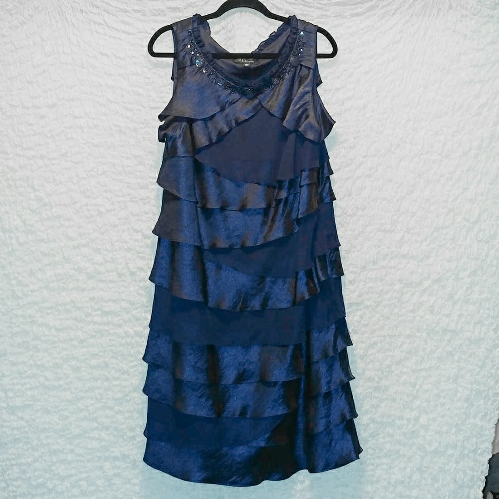 Navy blue, mid-length, sleeveless, ruffle dress